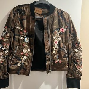 Trendy boomer jacket by Driftwood. Google the brand. Clothes are good quality.